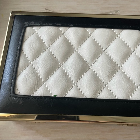 Metal quilted clutch with bow and chain strap - Picture 3 of 12